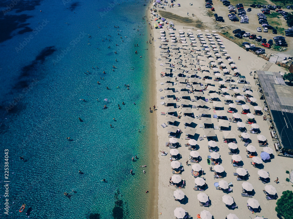 Beach with sun beds, view from above