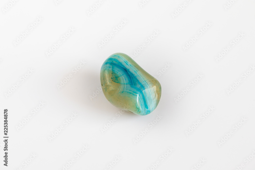 Natural mineral stone, blue green gemstone isolated on white background Natural mineral stone, blue green gemstone isolated on white background