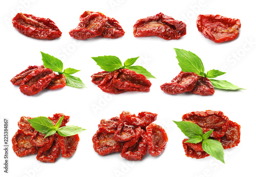 Set with sun dried tomatoes and basil on white background