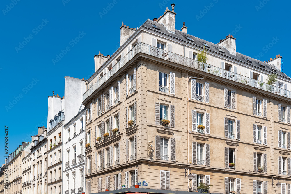 Paris, beautiful buildings, typical parisian facades in the Marais 
