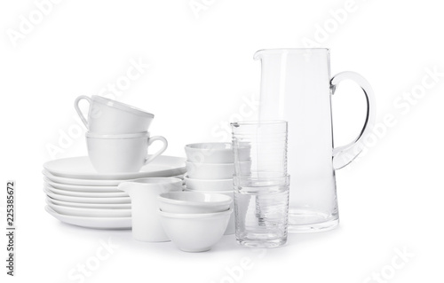 Set of clean tableware on white background. Washing dishes