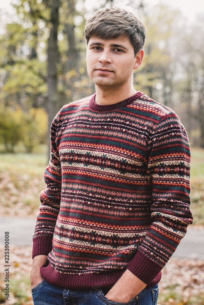 Handsome man in knitted sweater Handsome man in knitted sweater
