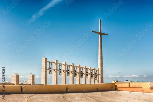 Cross and bells, Sanctuary of Saint Pio of Pietrelcina, Italy photo