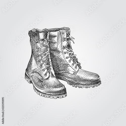 Hand Drawn Boots Sketch Symbol isolated on white background. Vector camping elements art highly detailed In Sketch Style. Sketched Boots vector illustration.