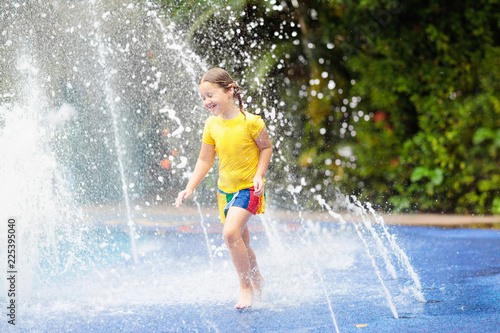 Canvas Print Kids at aqua park. Child in swimming pool.