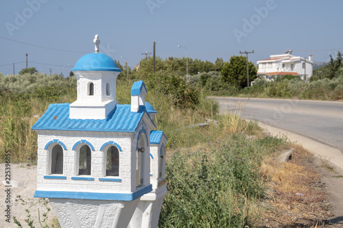 Traditional greek shrine on the roadside photo