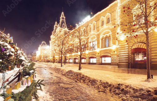 Winter Moscow at night. Festive decorations on Red Square near GUM. City is illuminated glowing and shining lights for celebration party. Beautiful Moscow in evening. Christmas and New Year time © dzmitrock87