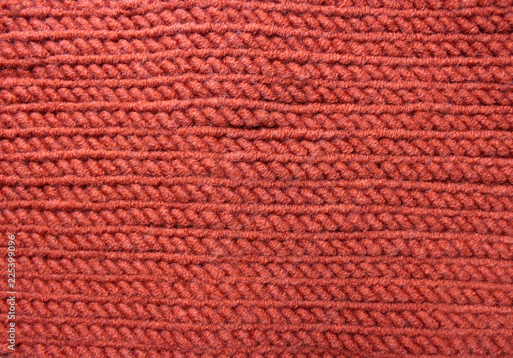 Fototapeta premium Knitted wool red background