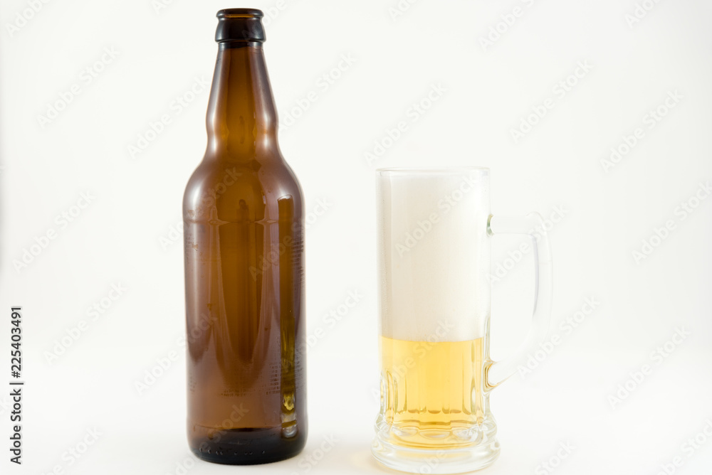beer bottles with glass cup on white background beer bottles with glass cup on white background