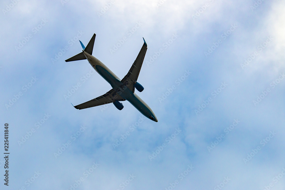 airplane in the blue sky