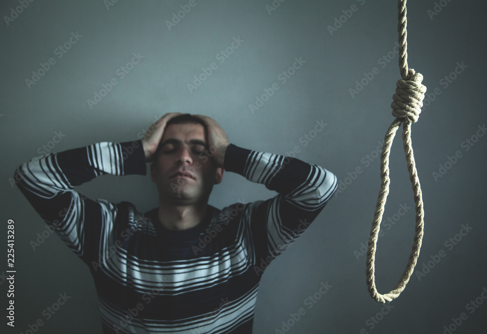 Caucasian depressed man with a noose. Suicide concept Stock 写真 ...