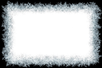 Decorative ice crystals frame on black matte background