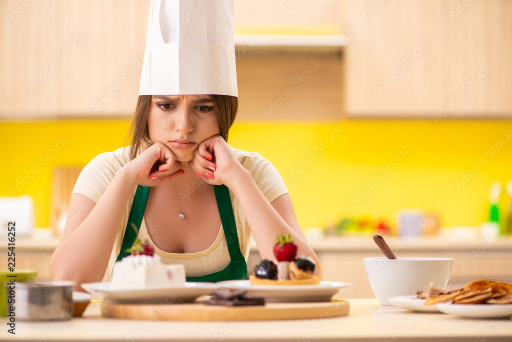 Young cook cooking cakes in the kitchen Young cook cooking cakes in the kitchen