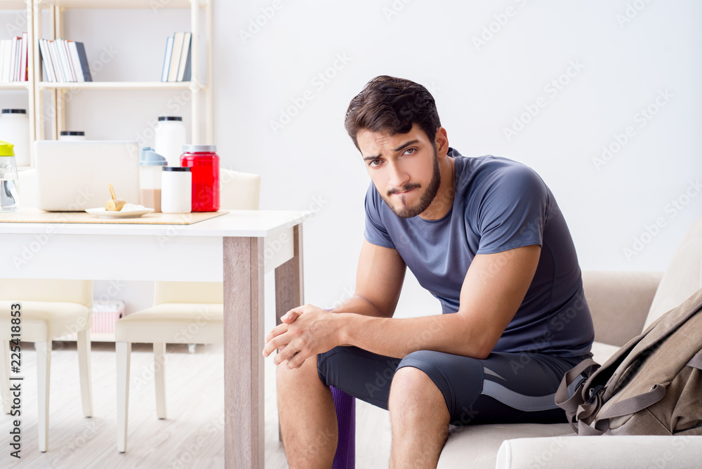 Young man getting ready for gym sports Young man getting ready for gym sports