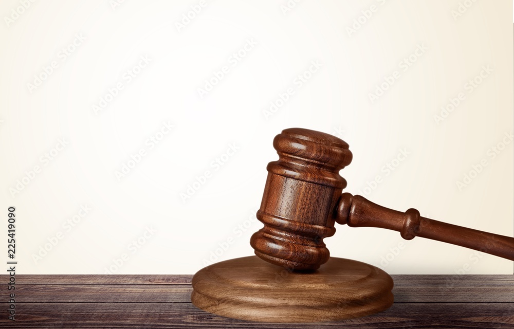 Wooden gavel on wooden table Wooden gavel on wooden table