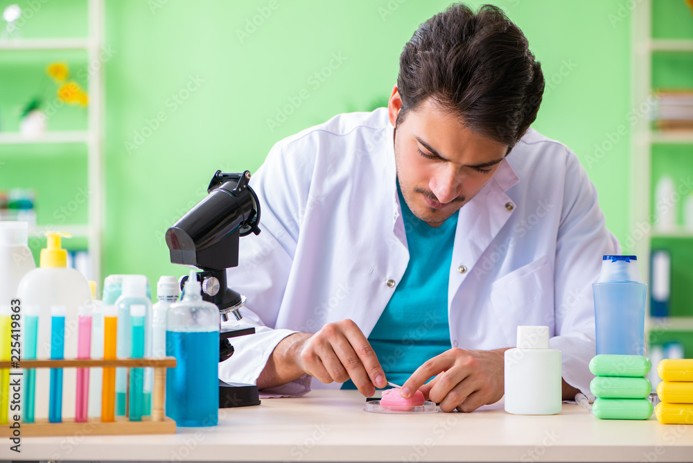 Chemist testing soap in the lab Chemist testing soap in the lab
