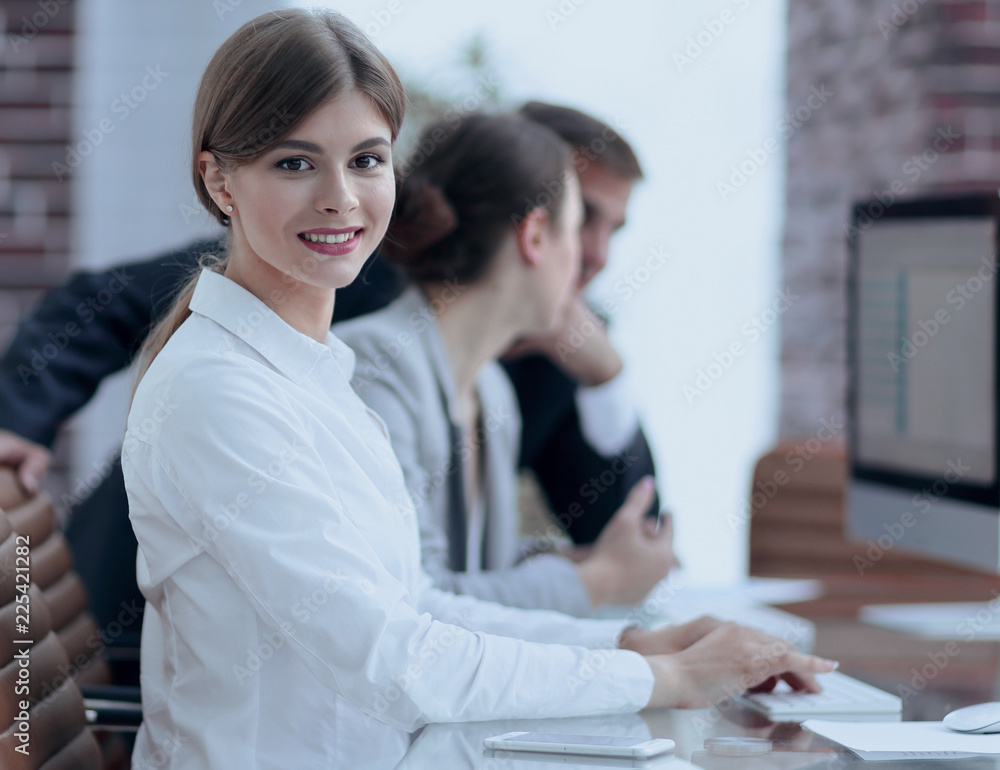 employees working on personal computers with financial data employees working on personal computers with financial data