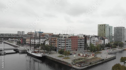 Wallpaper Mural Aerial view of Bonapartedok in Antwerp, Belgium with boats and yachts on a cloudy and foggy day. Torontodigital.ca