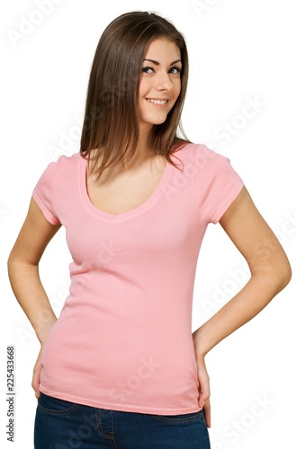Friendly Young Woman Standing with Hands on Hips - Isolated