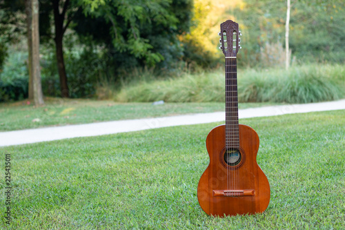 classical guitar on the grass