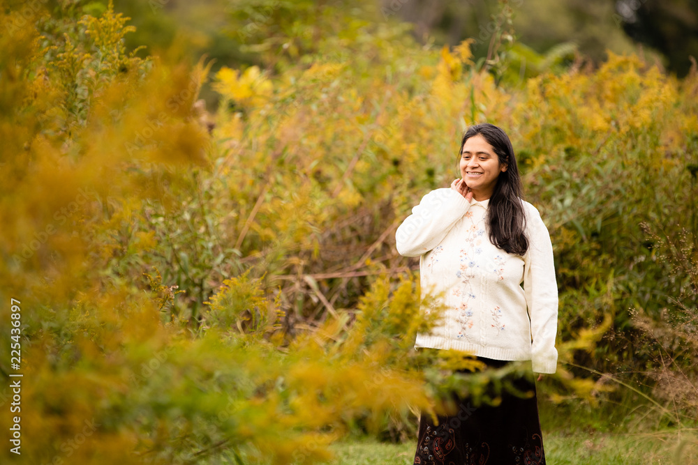 Hispanic Hispanic Woman Enjoying the Colorful Wild Flowers at Forest Preserve