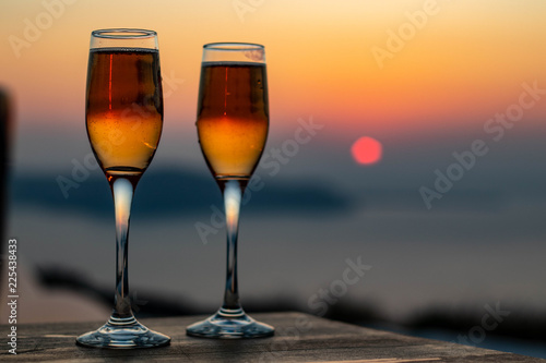 Bild auf Leinwand Drinks at Sunset, Santorini Greece