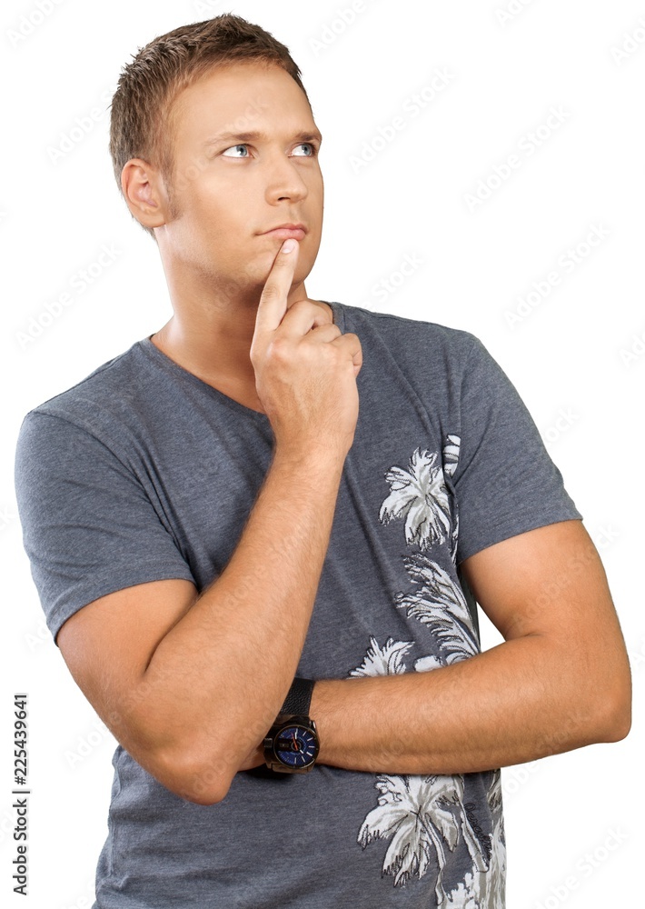 Male posing with his hand on his chin Male posing with his hand on his chin