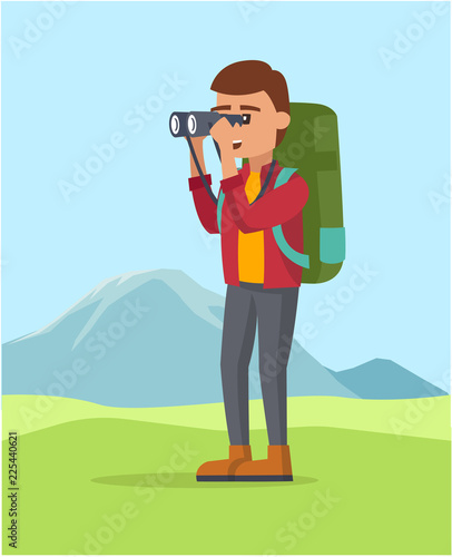 A guy seeing trough the binocular backpaking