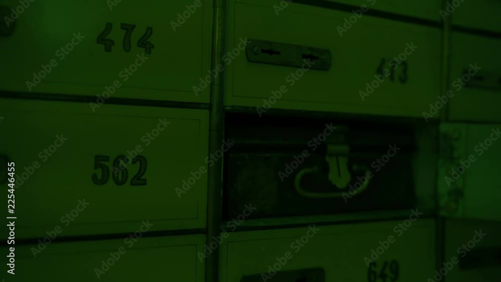 Safe Deposit Boxes in the bank vault room, bank prison room, bank cell bars, prison, prison cell bars and prison door Safe Deposit Boxes in the bank vault room, bank prison room, bank cell bars, prison, prison cell bars and prison door