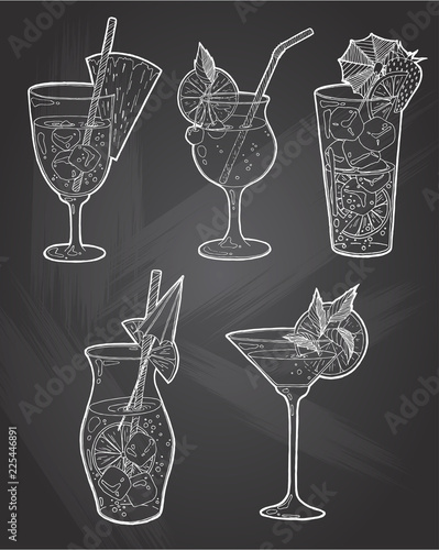 Hand drawn sketch ice alcoholic cocktails set with a slice of lemon and a umbrella and strawberry vintage . Vector for coctail menu in chalkboard background. Hand drawn design element