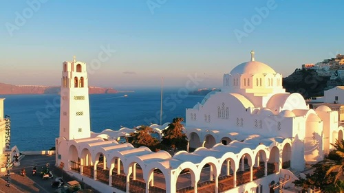 Aerial view of Thira in Santorini island at sunrise and its unique architecture.