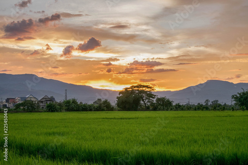 Evening sunset with the mountain behind the house looks very beautiful.