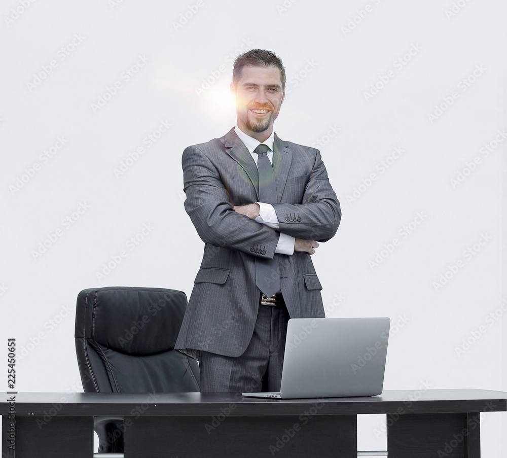successful leader, standing behind a Desk