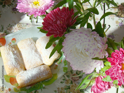 Wallpaper Mural Pink asters and cakes on the plate Torontodigital.ca