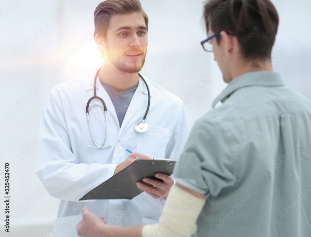 doctor writes a recommendation for the patient. doctor writes a recommendation for the patient.