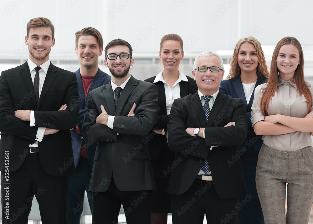 senior businessman and his confident business team senior businessman and his confident business team