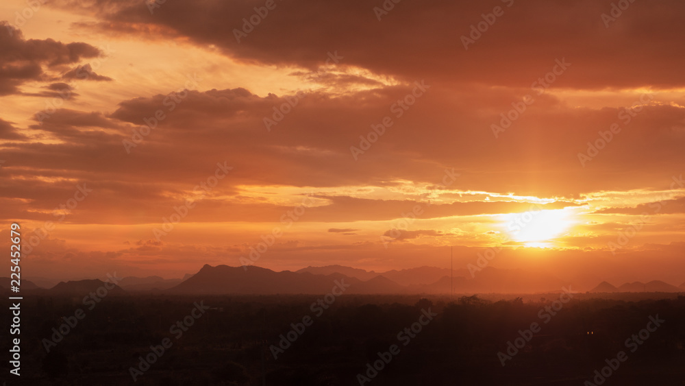Scenery sunrise or sunset silhouette view and sunlight  with mountain background on a morning time at thailand