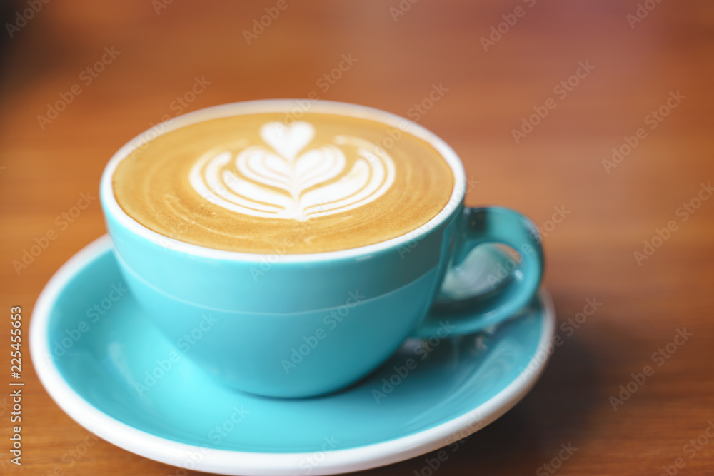 Cup of coffee with latte art pattern milk foam Cup of coffee with latte art pattern milk foam
