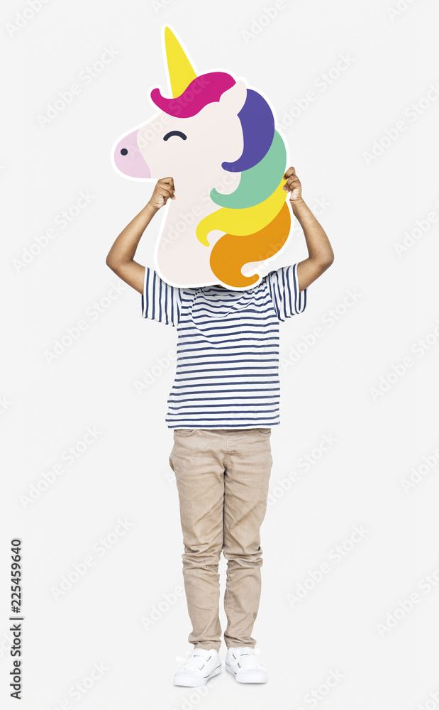 Little boy holding a unicorn icon