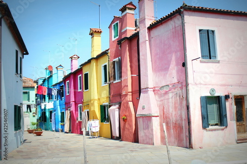 Street with colorful buildings in Burano island, Venice, Italy