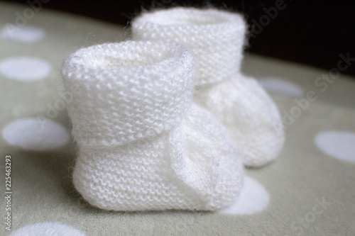  two baby white socks closeup on white background