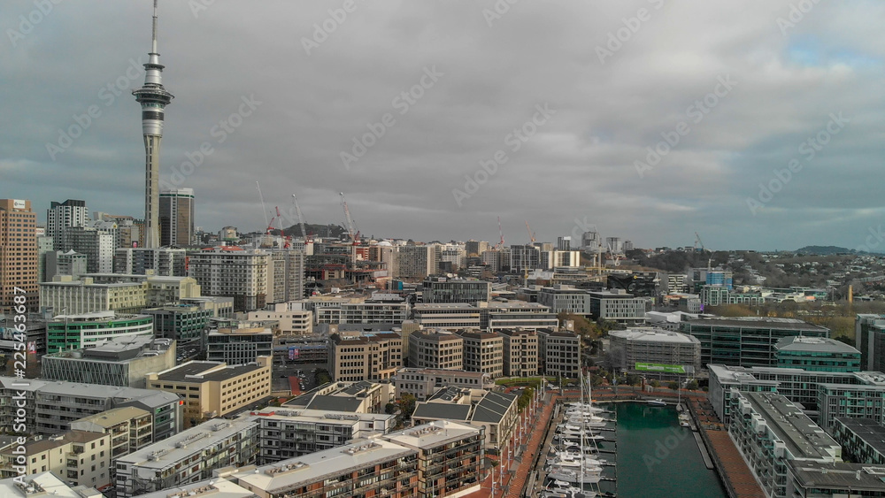 AUCKLAND, NEW ZEALAND - AUGUST 26, 2018: Aerial view of cityscape at sunset. More than 1 million tourists visit Auckland annually