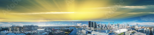 Sydney, Australia. Sunset panoramic aerial view of Darling Harbour and city skyscrapers from Wentworth Park. © jovannig