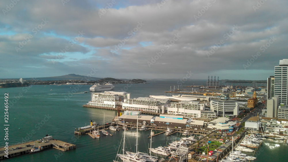 AUCKLAND, NEW ZEALAND - AUGUST 26, 2018: Aerial view of cityscape at sunset. More than 1 million tourists visit Auckland annually