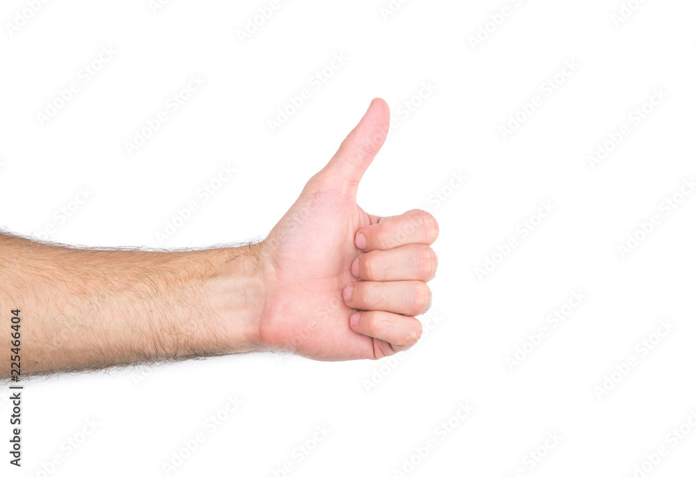 Mans thumb up hand isolated on a white background. Mans thumb up hand isolated on a white background.