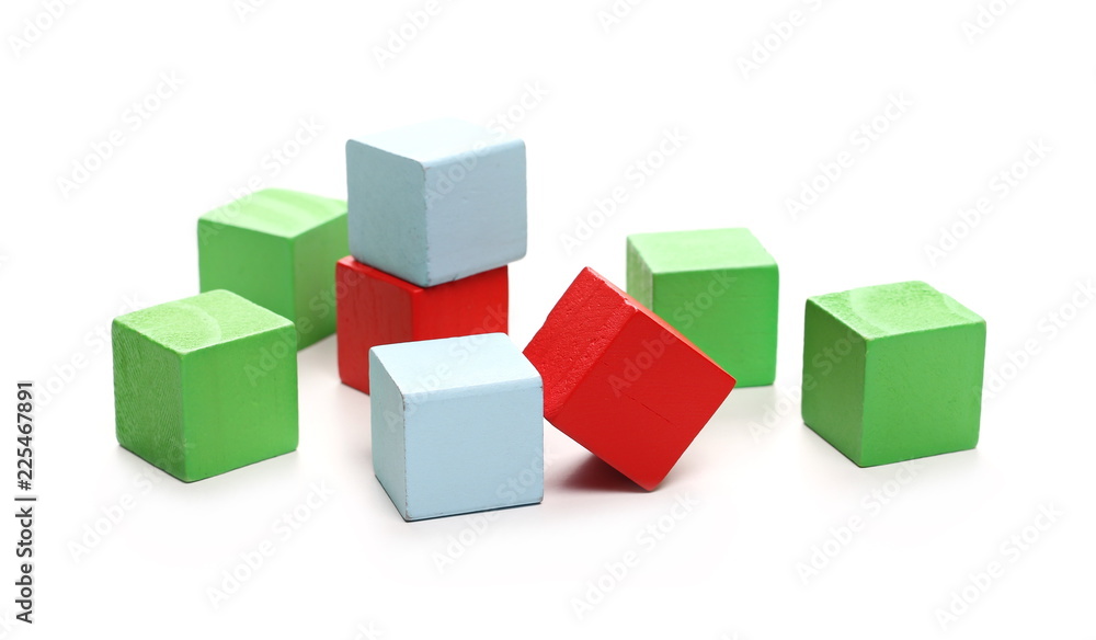 Wooden building blocks for children, isolated on white background 