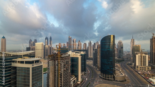 Dubai business bay towers early morning aerial timelapse.