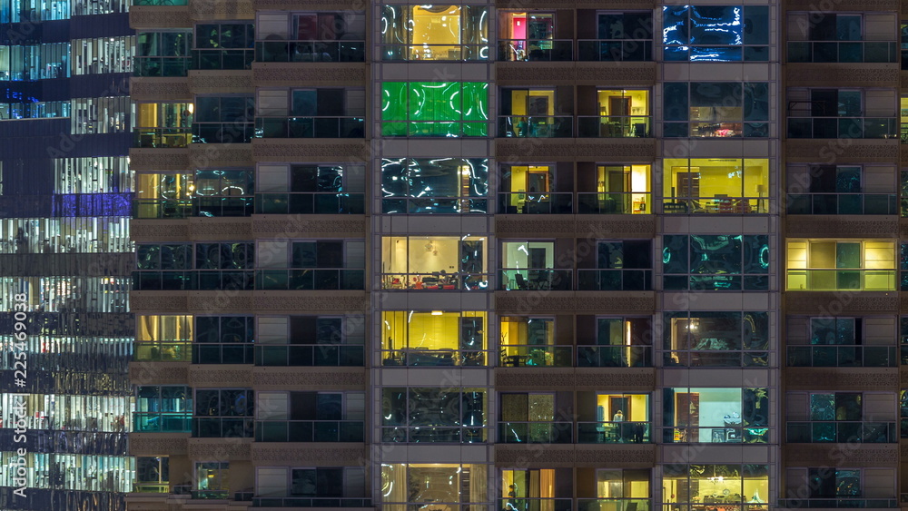 Scenic glowing windows of skyscrapers at evening timelapse Scenic glowing windows of skyscrapers at evening timelapse