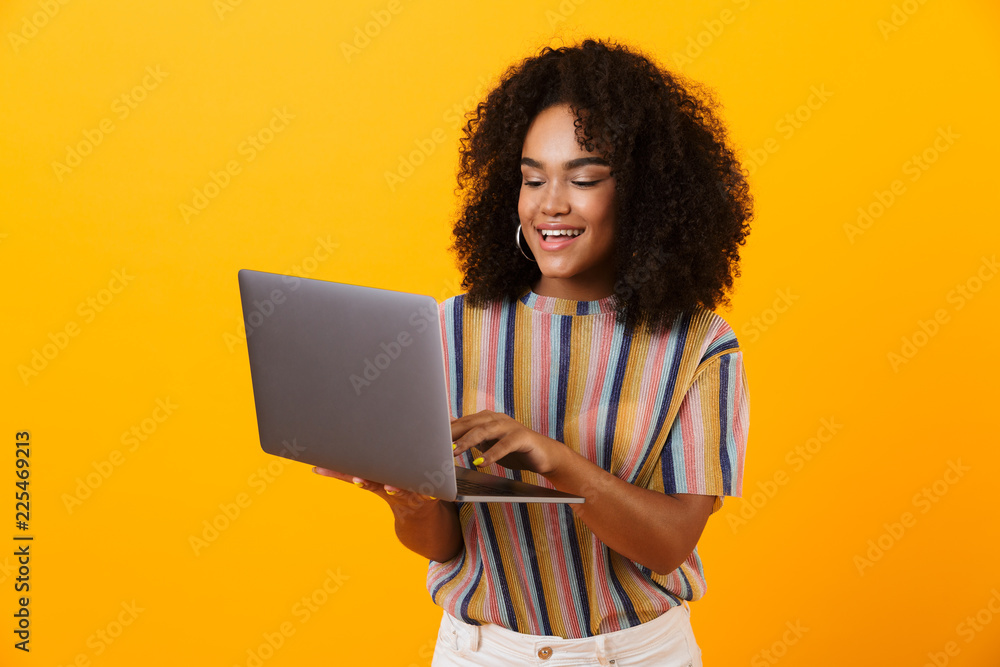 Portrait of a happy african woman standing Portrait of a happy african woman standing