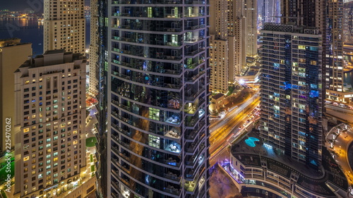 Night illumination of Dubai Marina aerial timelapse  UAE.